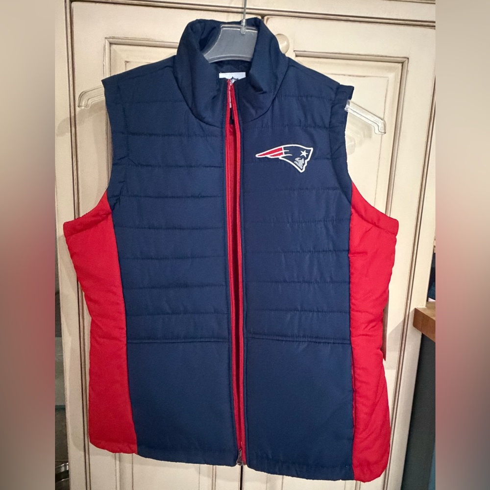 Red Patriots Puffer Vest. Never worn. Tags on.